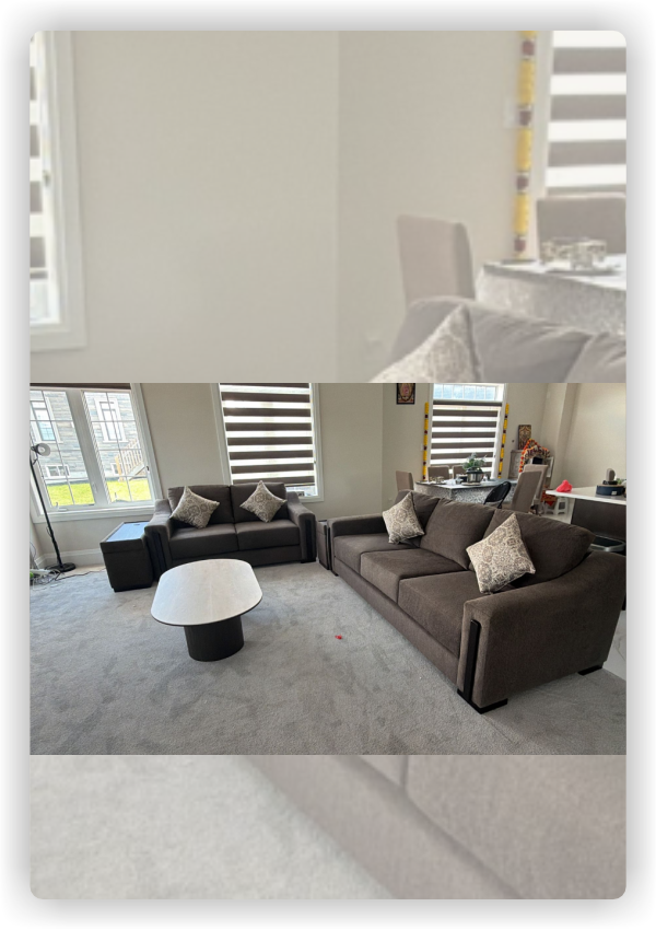 Customer living room featuring modern charcoal grey sofa and loveseat set with accent cushions, showcasing Another One Verified Buyers Review from Midha's Furniture Gallery Ontario, serving Brampton, Mississauga, Scarborough, Cambridge, and London.
