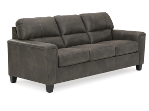 Upgrade to the modern Navi Sofa by Ashley Furniture. This 3-seater couch offers faux leather appeal in a Smoke finish with superior comfort. Durable design resists sagging. Find your new complete home furniture centerpiece.